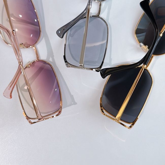 MiuMiu Sunglasses 821490-7